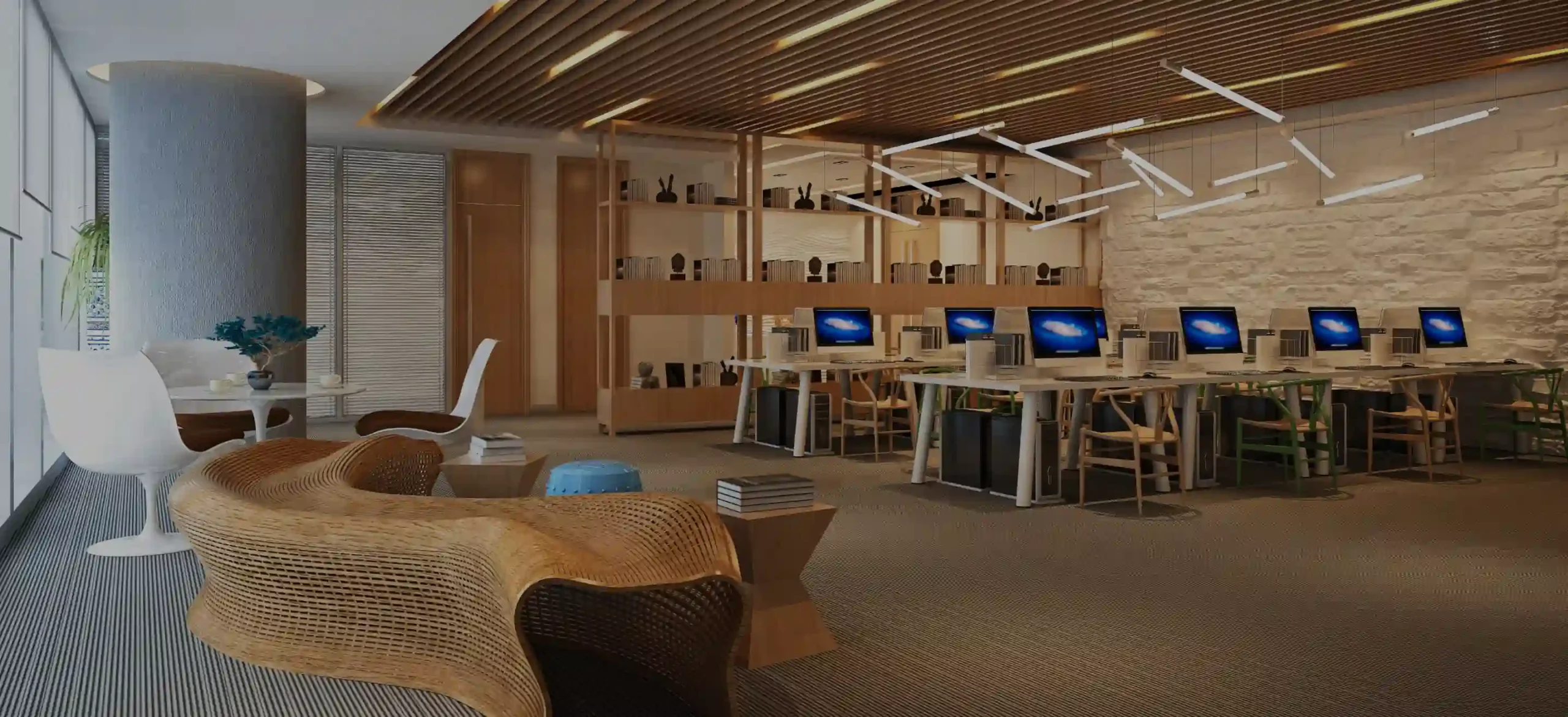 A room with a computer desk and chairs – Jani-King cleans educational institutions.